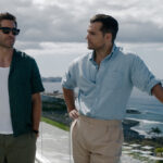 Henry Cavill e Jake Gyllenhaal em uma cena de ação intensa do filme In the Grey.