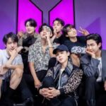 Membros do grupo BTS em show da turnê 2026