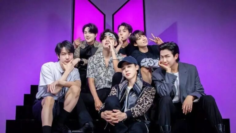 Membros do grupo BTS em show da turnê 2026