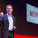 Executivos da Netflix em evento oficial da plataforma de streaming.