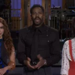 A cantora Anitta sorridente em vídeo promocional ao lado do ator Colman Domingo