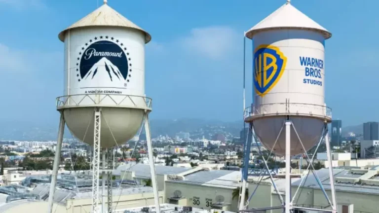 Foto da fachada da Warner Bros com logotipo da Paramount ao lado, destacando a aquisição estratégica do estúdio