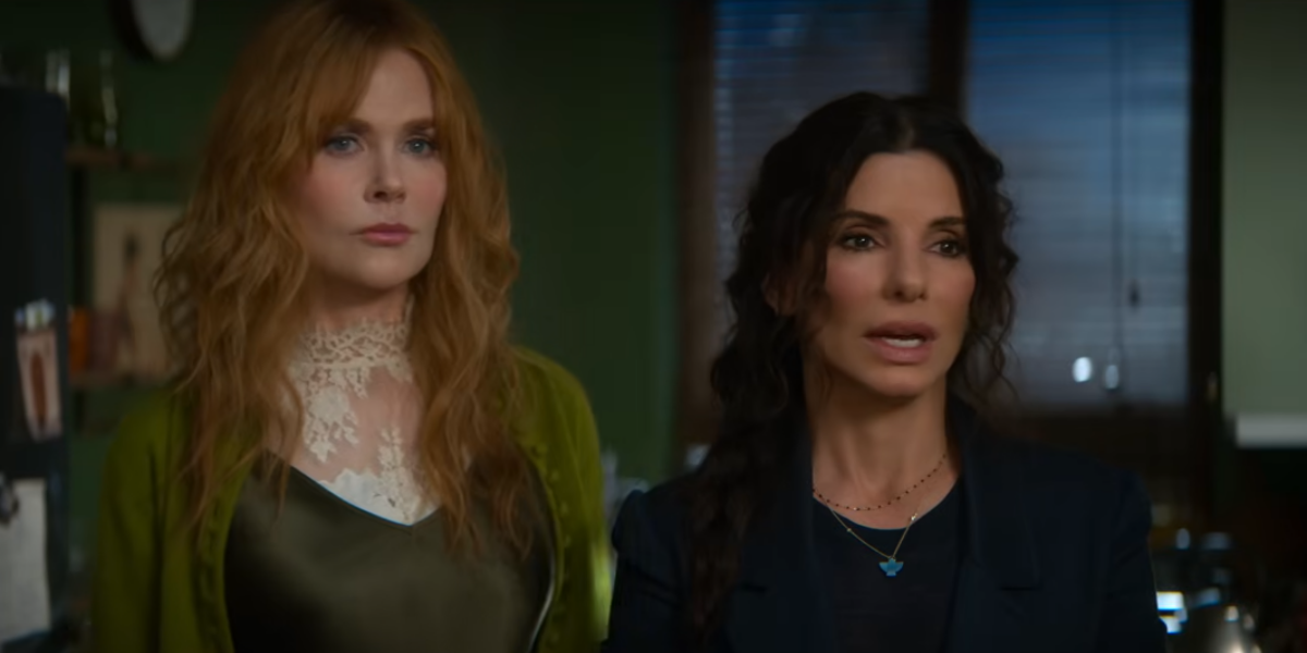 Cena do trailer de Da Magia à Sedução 2 com Sandra Bullock e Nicole Kidman em contexto sombrio