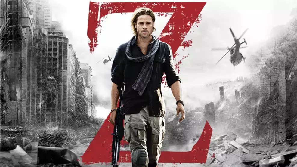 Multidão de zumbis escalando um muro alto em cena de Guerra Mundial Z