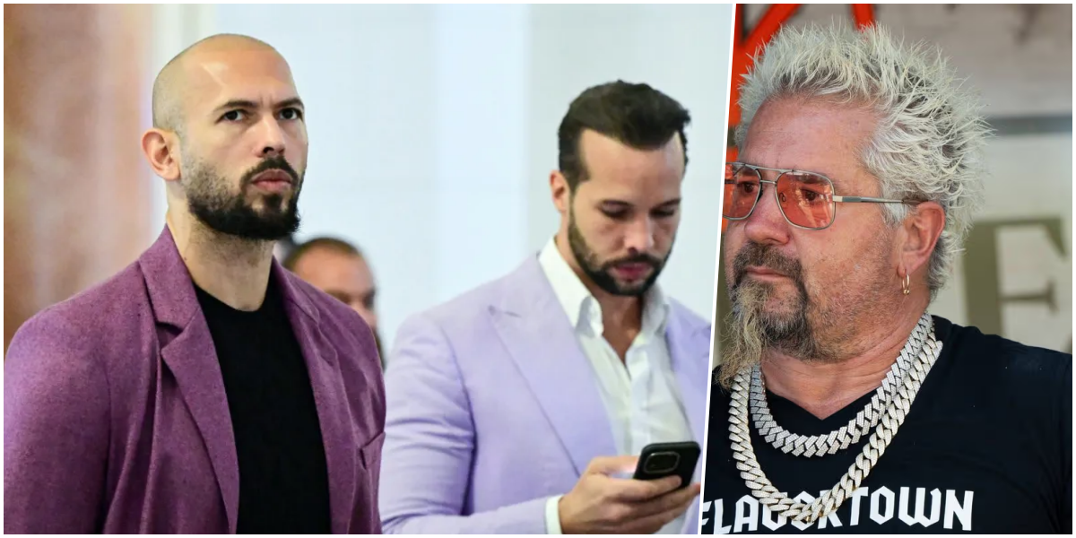 O apresentador Guy Fieri em um evento público, sorrindo e usando seus óculos característicos.