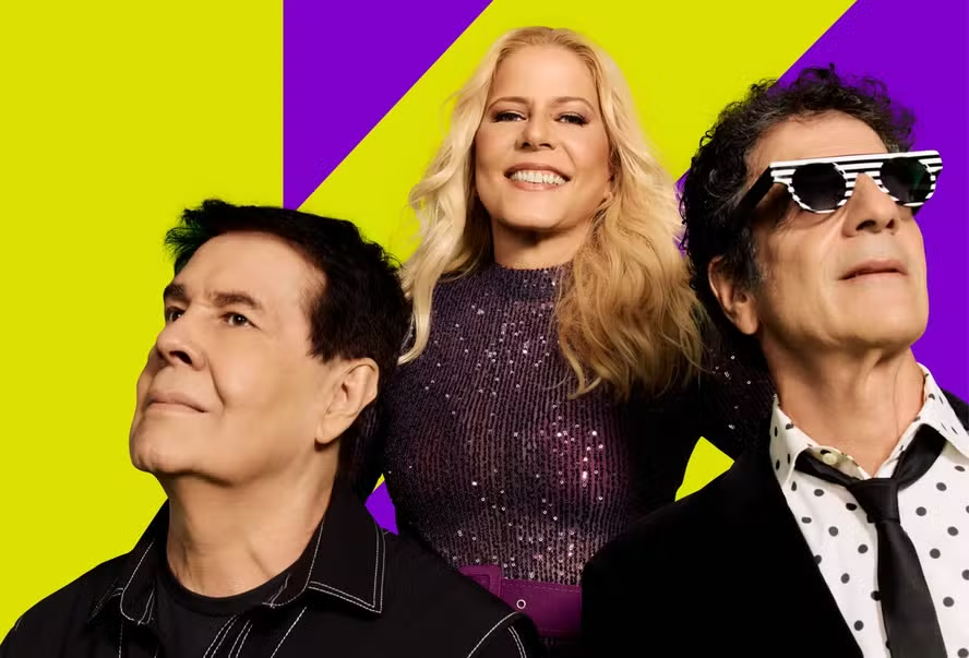 Paula Toller George Israel e Bruno Fortunato do grupo Kid Abelha sorrindo juntos