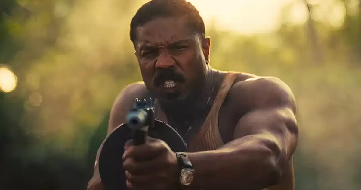 michael-b-jordan-thomas-crown-a-arte-do-crime Michael B. Jordan e Adria Arjona sorriem durante a apresentação de Thomas Crown: A Arte do Crime no palco da CinemaCon.