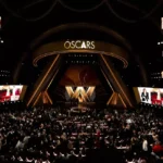 Estatueta do Oscar em destaque representando anúncio das datas das cerimônias de 2027 e 2028