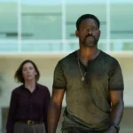 Cena da terceira temporada de Paradise com Xavier e Teri fora do bunker após evacuação