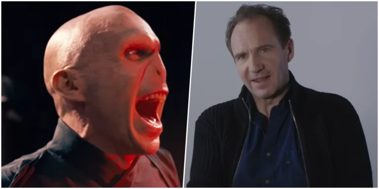 O ator Ralph Fiennes em um evento de gala sorrindo para as câmeras.