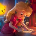 Cena da animação Super Mario Galaxy com os personagens principais em uma aventura espacial.