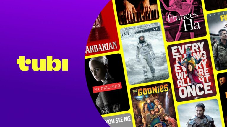 Tela com interface de streaming exibindo catálogo de filmes Tubi com destaque para Jogos Vorazes e Priscilla em seleção de maio