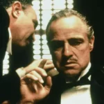 Connie Corleone em cena de O Poderoso Chefão, personagem que ganhará romance inédito.