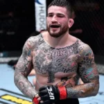 Sean Brady domina Joaquin Buckley no UFC 328 com forte atuação no grappling ao longo de três rounds.