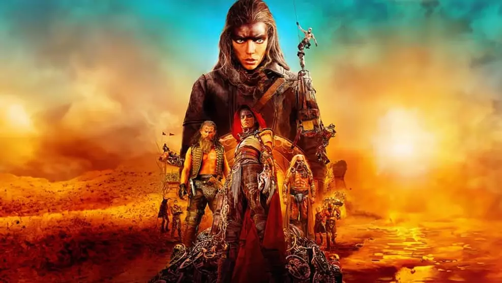 mad-max-novo-filme-serie George Miller durante evento relacionado à franquia Mad Max, que pode ganhar novo filme e série de TV.