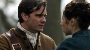 Henry e Julia enfrentam destinos opostos após a separação na segunda temporada de “Outlander: Blood of My Blood”.