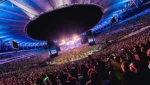 Fachada do Estádio do Maracanã em dia de evento, destacando a magnitude da arena para shows.
