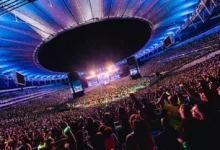 Fachada do Estádio do Maracanã em dia de evento, destacando a magnitude da arena para shows.