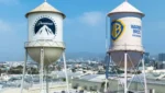 Foto da fachada da Warner Bros com logotipo da Paramount ao lado, destacando a aquisição estratégica do estúdio