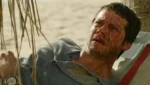 Cena de Socorro! com personagens isolados em ilha deserta no novo filme de Sam Raimi.