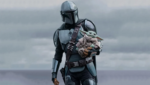 Din Djarin e Grogu em cena de O Mandaloriano e Grogu durante nova aventura da franquia Star Wars.