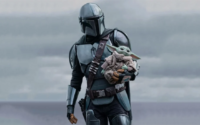 Din Djarin e Grogu em cena de O Mandaloriano e Grogu durante nova aventura da franquia Star Wars.
