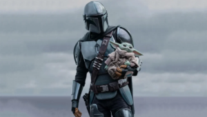 Din Djarin e Grogu em cena de O Mandaloriano e Grogu durante nova aventura da franquia Star Wars.