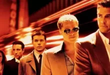 Os atores Bradley Cooper e Margot Robbie, que protagonizarão a nova história da franquia Onze Homens e um Segredo.