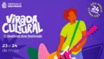 Palco da Virada Cultural em São Paulo com público durante shows no Vale do Anhangabaú.